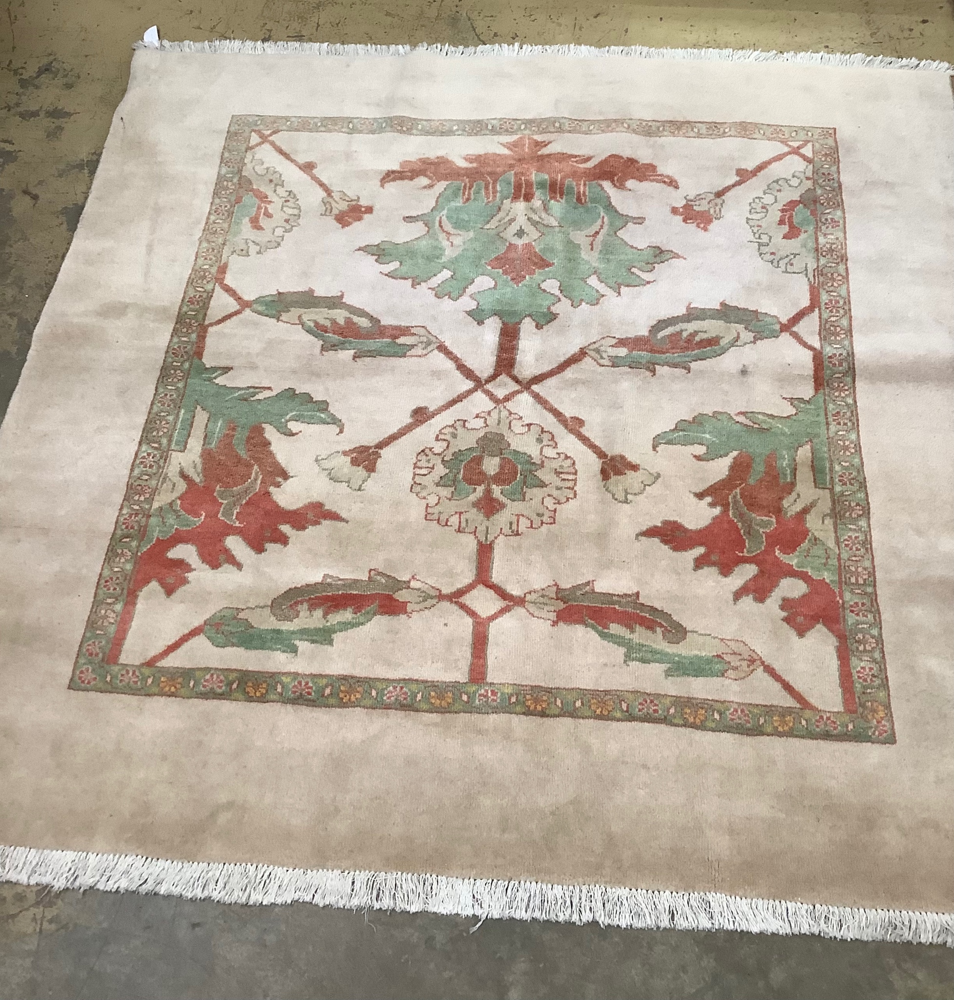 A Persian fawn ground carpet, 180 x 188cm